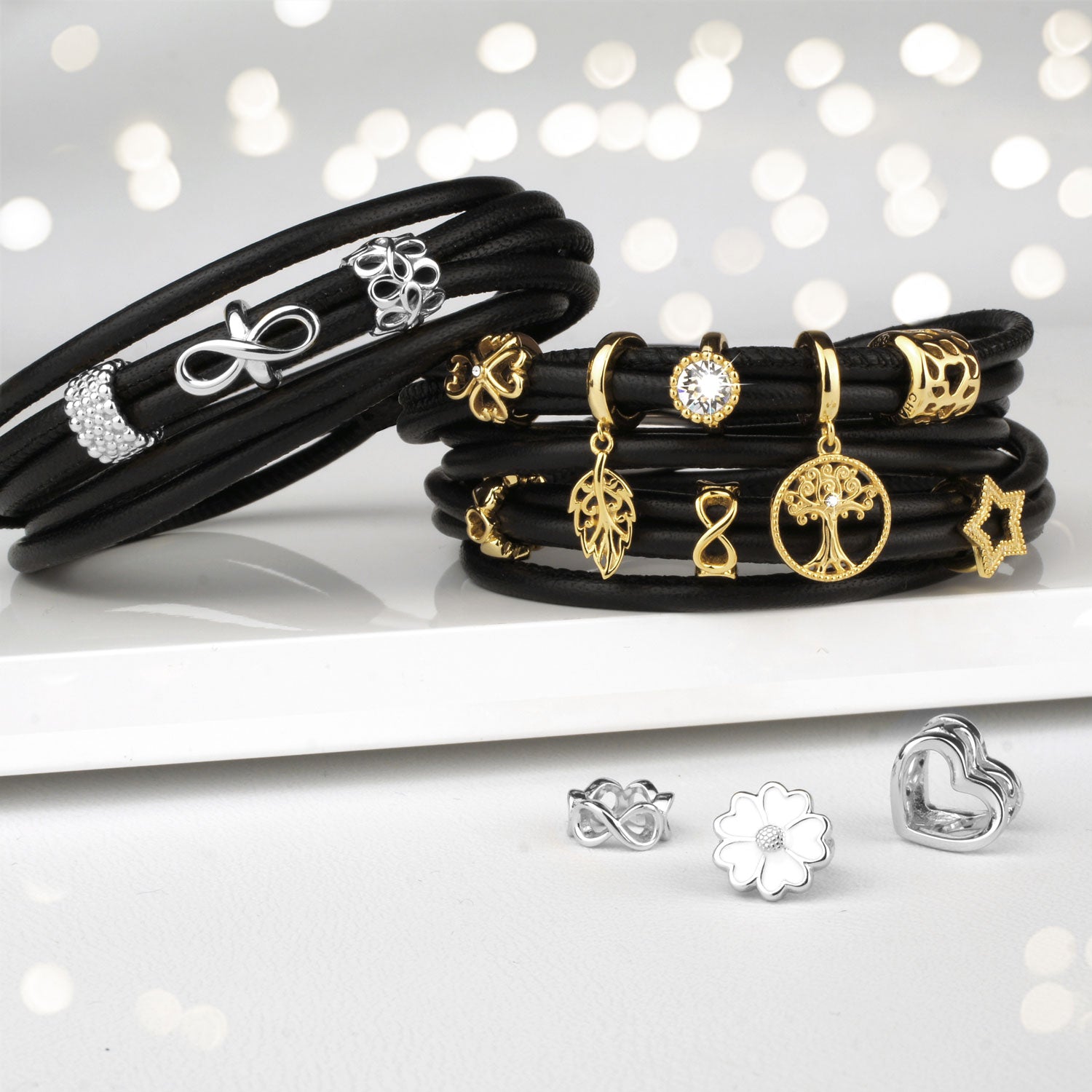 lederarmband damen mit gold und silber charms